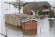 City buildings surrounded by flood waters June 03, 2019 (JPG)
