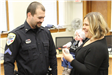 030323 Police Promotion Corporal Mitch Griffin badge pinned by spouse