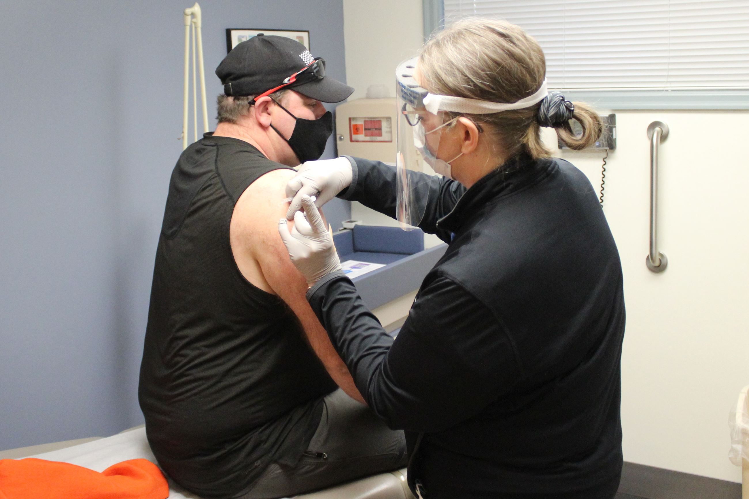 122320 Vaccine EMS 06 Fruitland Fire Lt. MIchael Briggs receives vaccine (JPG)