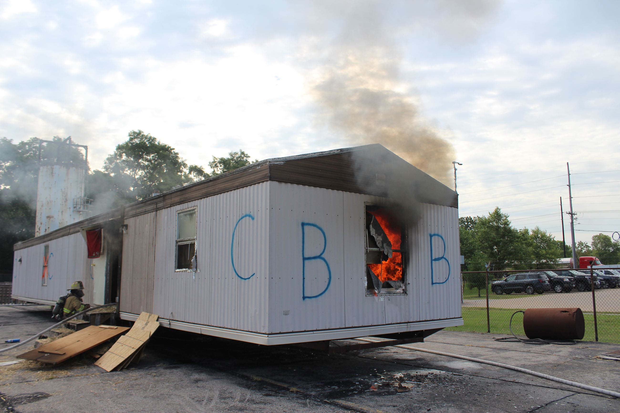 Mobile home begins to burn - Fire Academy Training Burn 090222 (JPG)