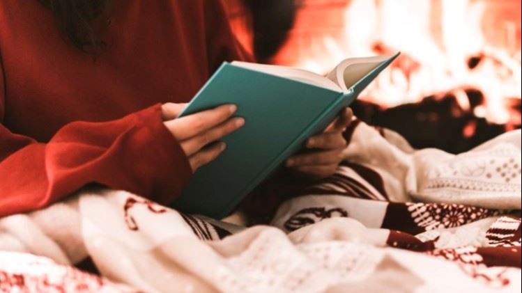 Winter Reading Program - reading by firelight (JPG)