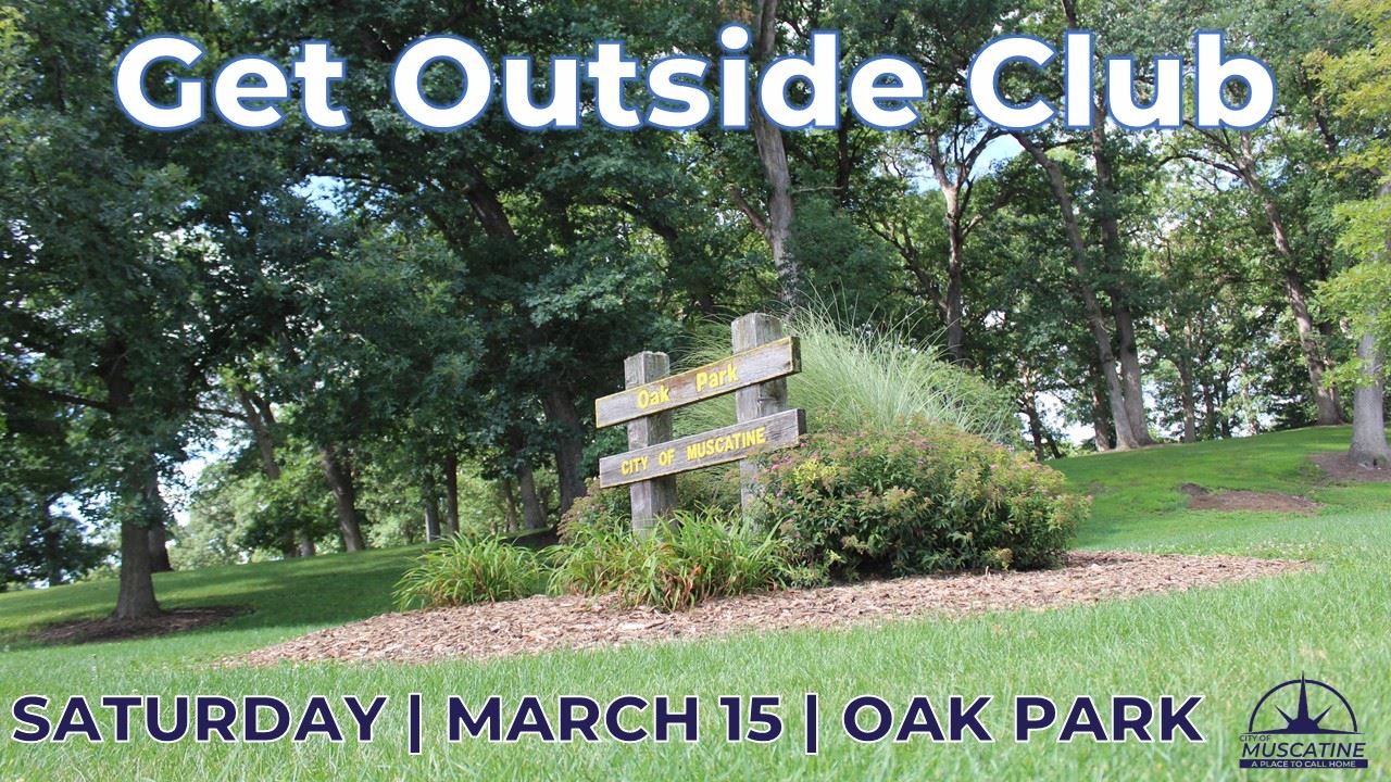 Entrance to Oak Park in Muscatine showing sign and oak trees (JPG)