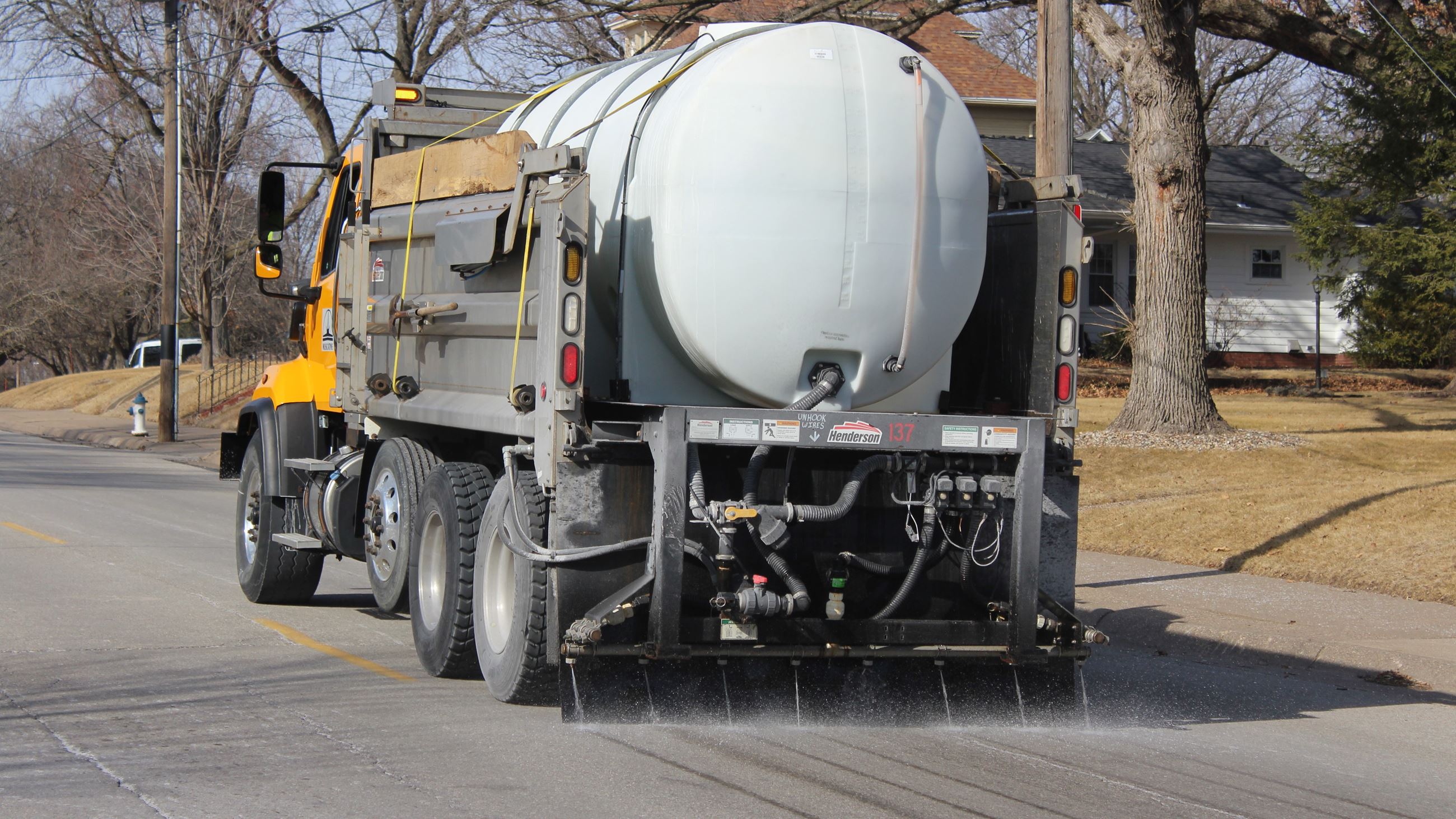 Truck sprays Brine onto city streets (JPG) 021025 